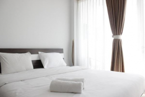 Pleasant 1BR Apartment with Sofa Bed at Dago Suites By Travelio